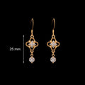 Size reference of Bérénice Regency crystal drop earrings showing 25 mm drop with french hooks